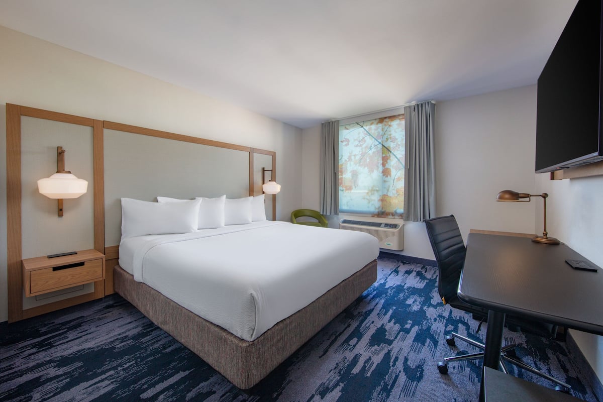 Premium bedding, down duvets, in-room safe, desk