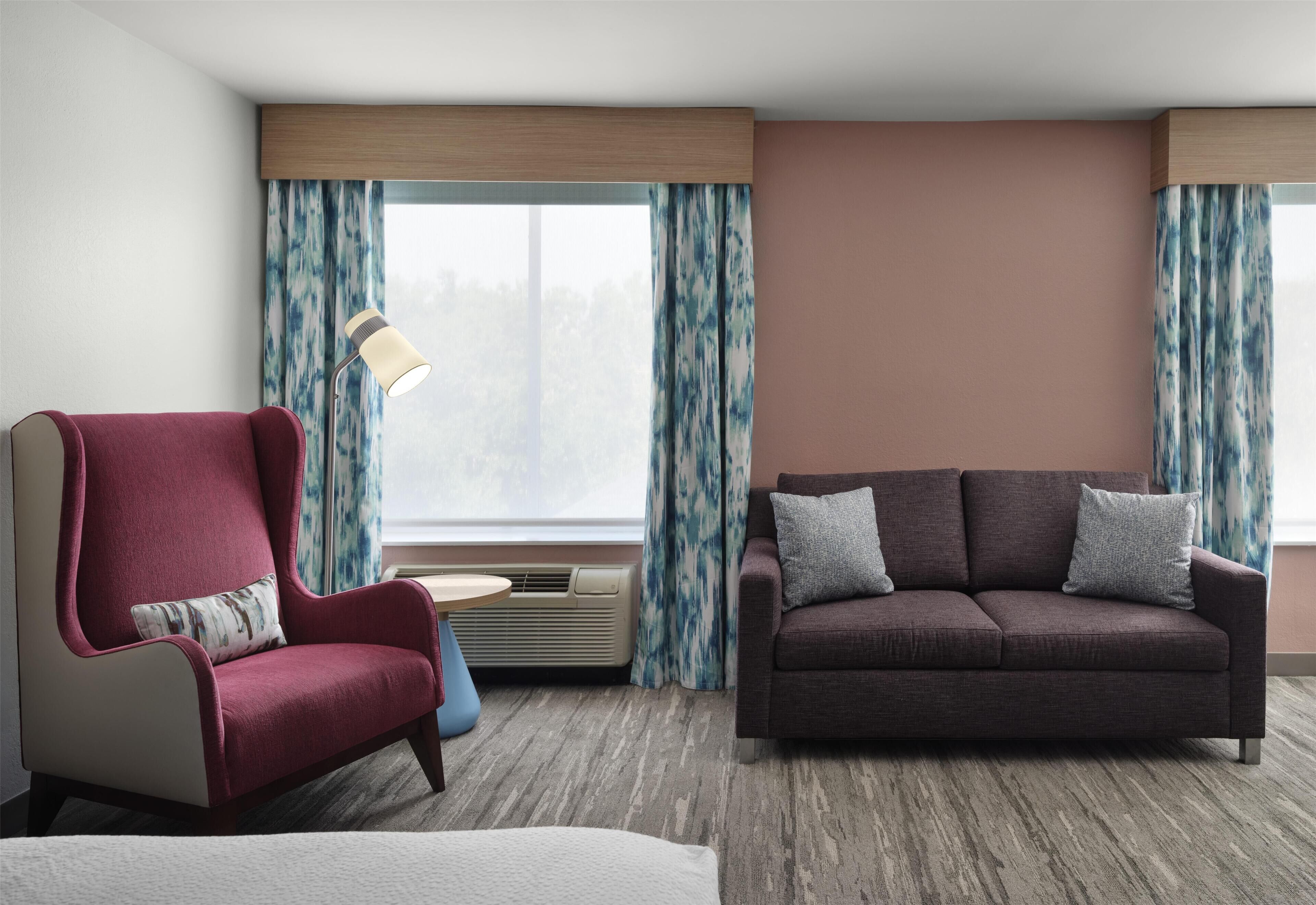 1 KING BED DELUXE WITH SOFABED | Living area | 55-inch flat-screen TV with digital channels, TV, Netflix