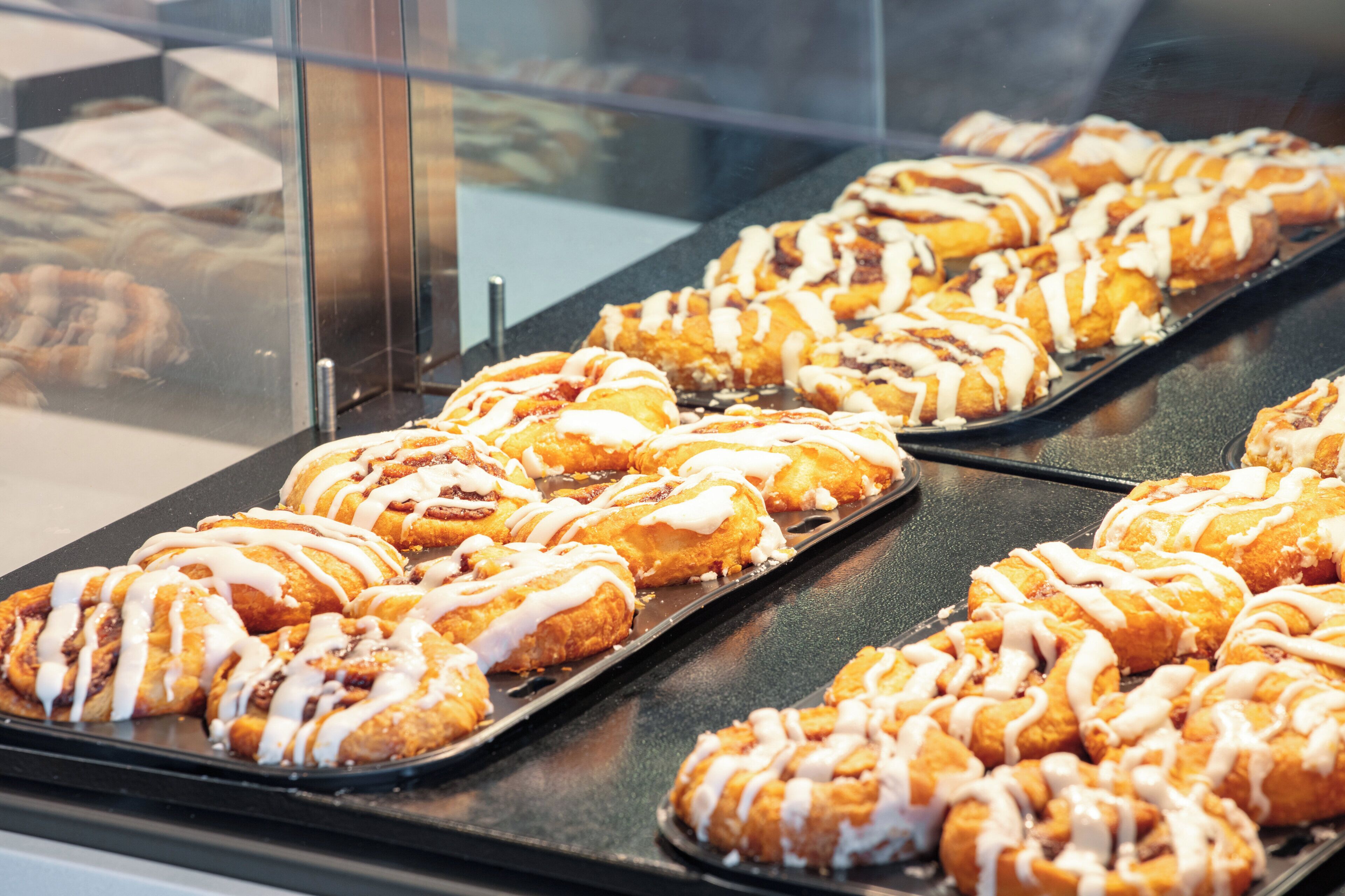 A display case with pastries.