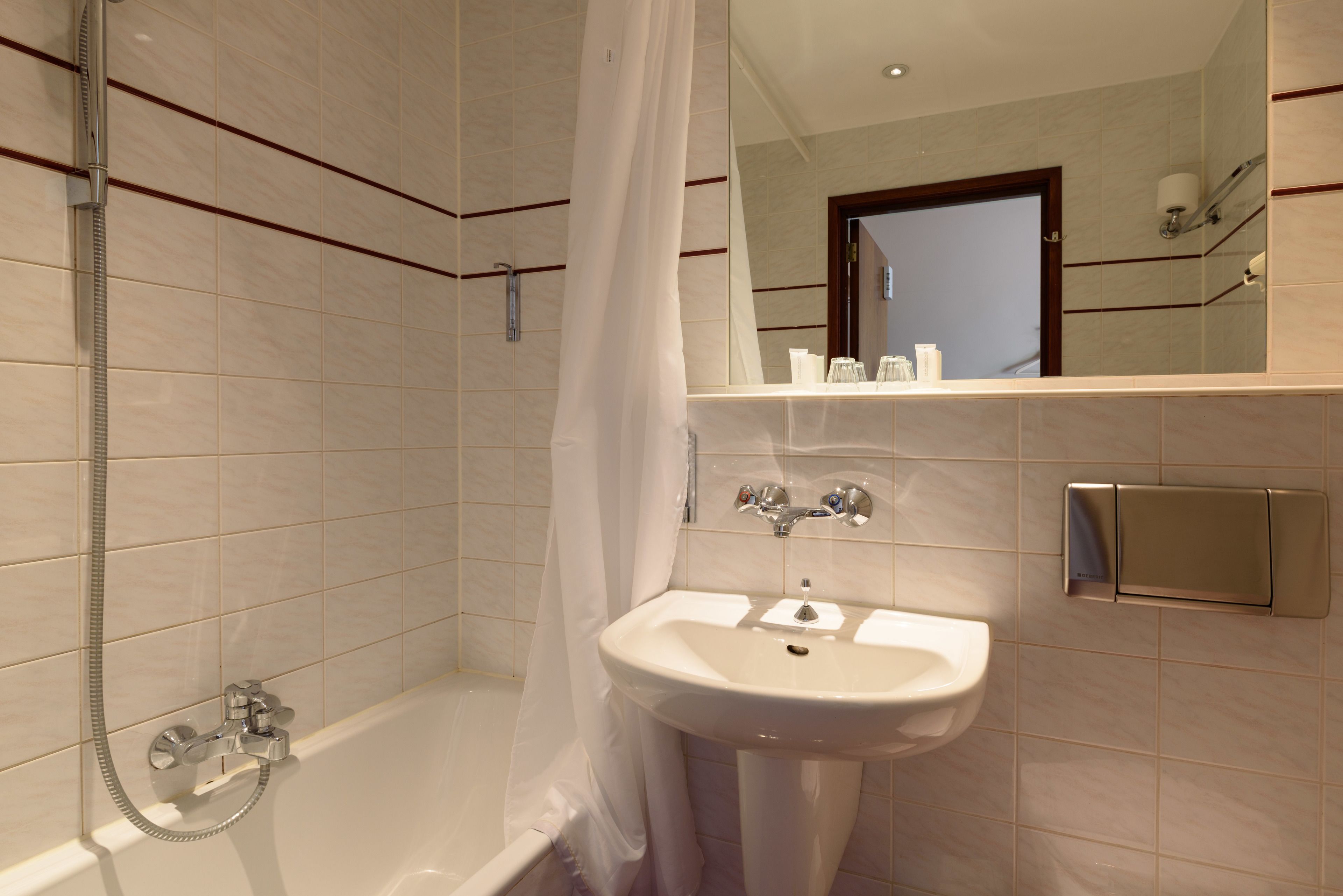 standard double or twin room | bathroom | hair dryer, towels