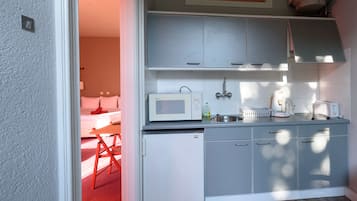 Triple Room | Private kitchen | Fridge