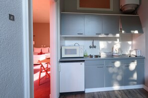 Triple Room | Private kitchen | Fridge