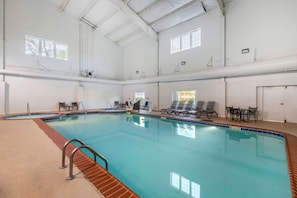Indoor pool, outdoor pool, pool umbrellas, pool loungers