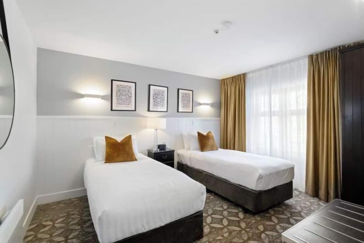 1 slaapkamer, een strijkplank/strijkijzer, gratis wifi, beddengoed