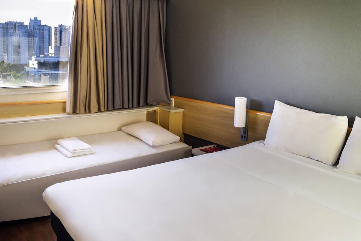 Standard Room, Multiple Beds | Minibar, in-room safe, desk, blackout drapes