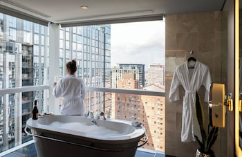 Presidential Suite, 1 King Bed | Bathroom | Separate tub and shower, designer toiletries, hair dryer, bathrobes at Sofitel Chicago Magnificent Mile