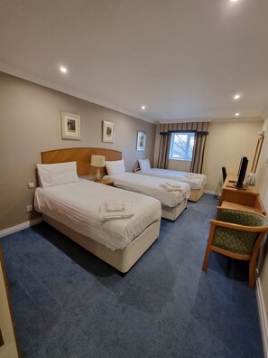 Family Double or Twin Room | Down comforters, in-room safe, desk, laptop workspace
