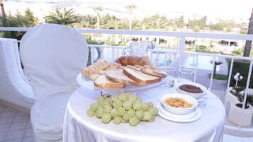 Breakfast, lunch, dinner served; local cuisine, alfresco dining