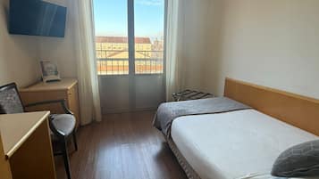 Single Room | Down comforters, minibar, in-room safe, desk