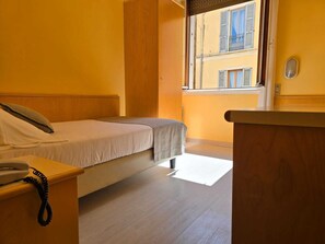 Single Room | Down comforters, minibar, in-room safe, desk