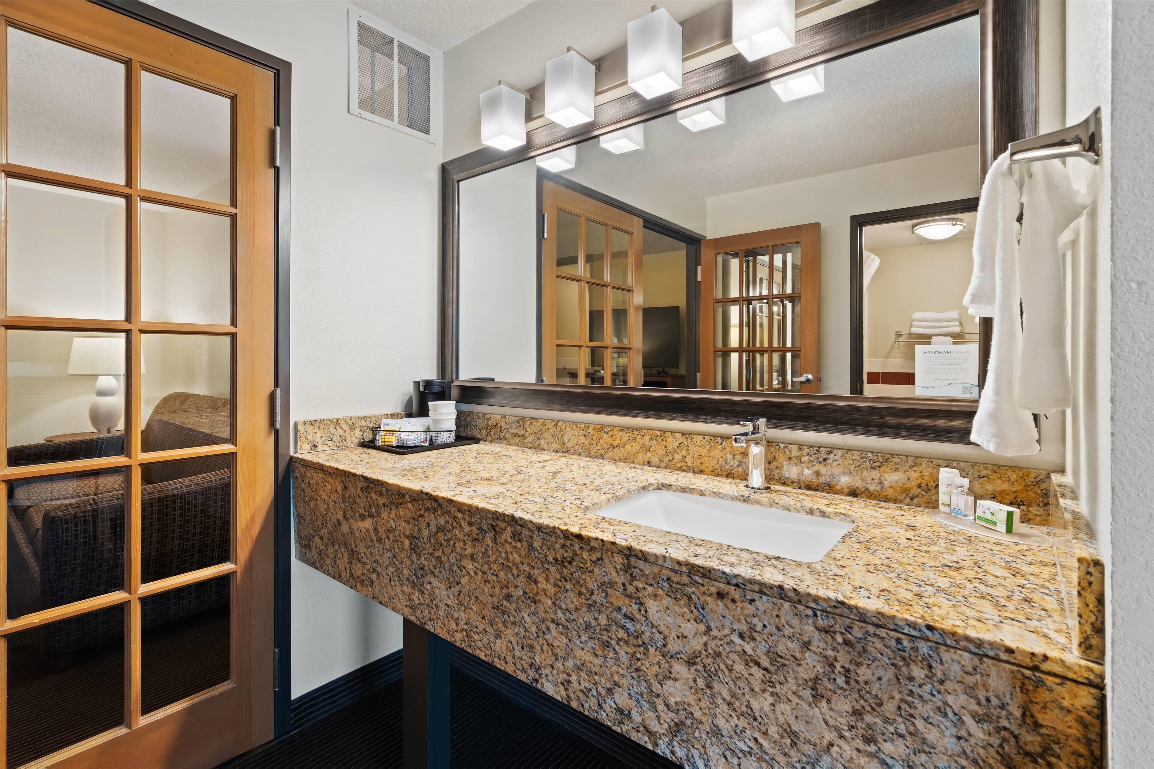 superior suite, 1 king bed, non smoking (one-bedroom) | bathroom | free toiletries, hair dryer, towels, soap