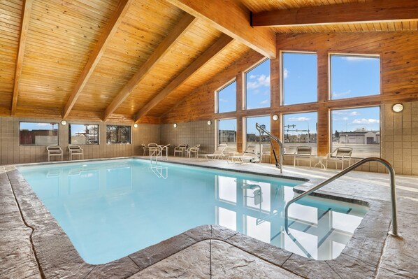 Indoor pool, open 7 AM to 10 PM, pool loungers