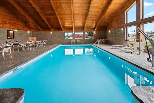 Indoor pool, open 7 AM to 10 PM, sun loungers