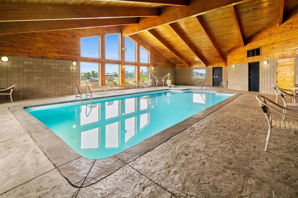 Indoor pool, open 7 AM to 10 PM, pool loungers