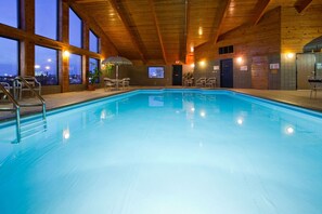 Indoor pool, open 7 AM to 10 PM, pool loungers