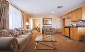Suite, 1 Queen Bed (Village) | Premium bedding, in-room safe, iron/ironing board, free WiFi