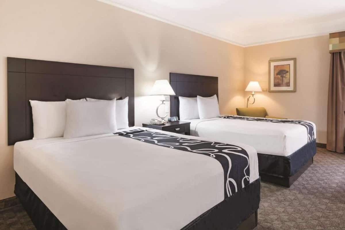 Premium bedding, desk, blackout drapes, soundproofing