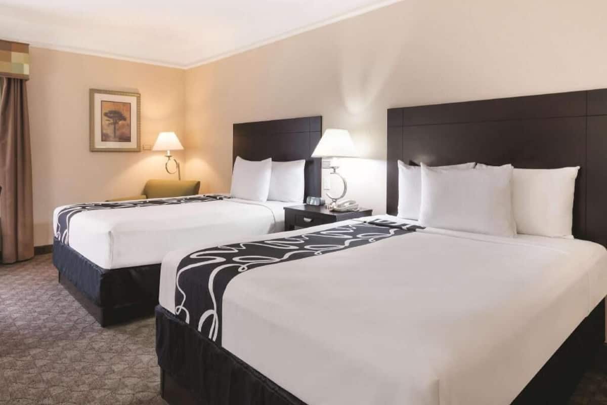 Premium bedding, desk, blackout drapes, soundproofing