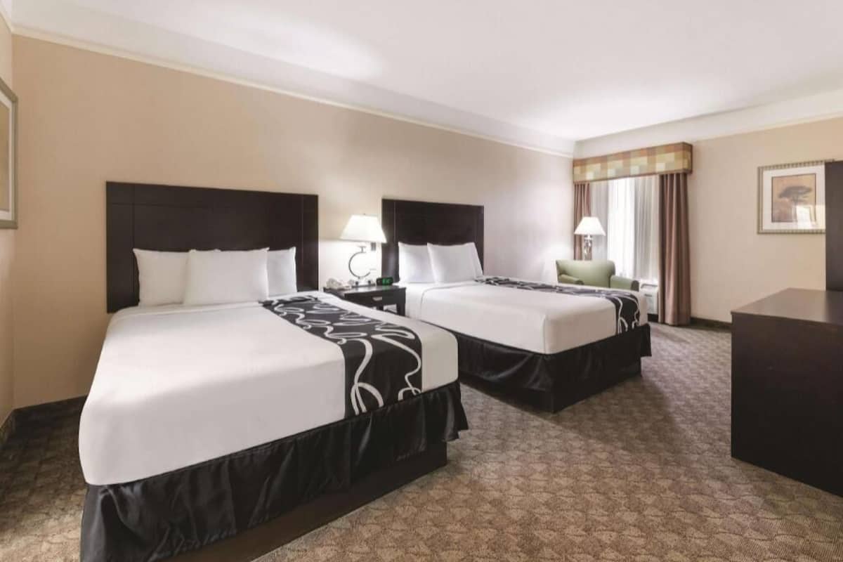 Premium bedding, desk, blackout drapes, soundproofing