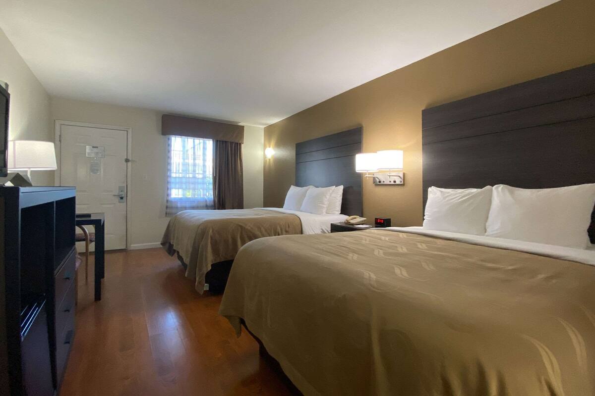 Standard Room, 2 Queen Beds, Non Smoking | Desk, iron/ironing board, WiFi (free), alarm clocks