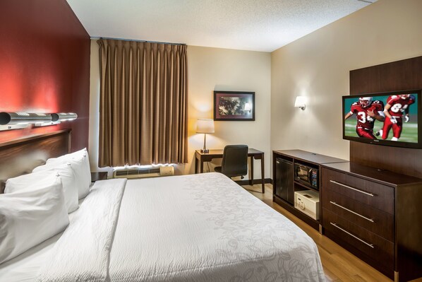 Desk, laptop workspace, blackout curtains, iron/ironing board