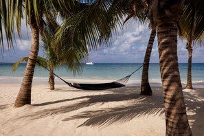 Private beach, white sand, beach cabanas, sun-loungers