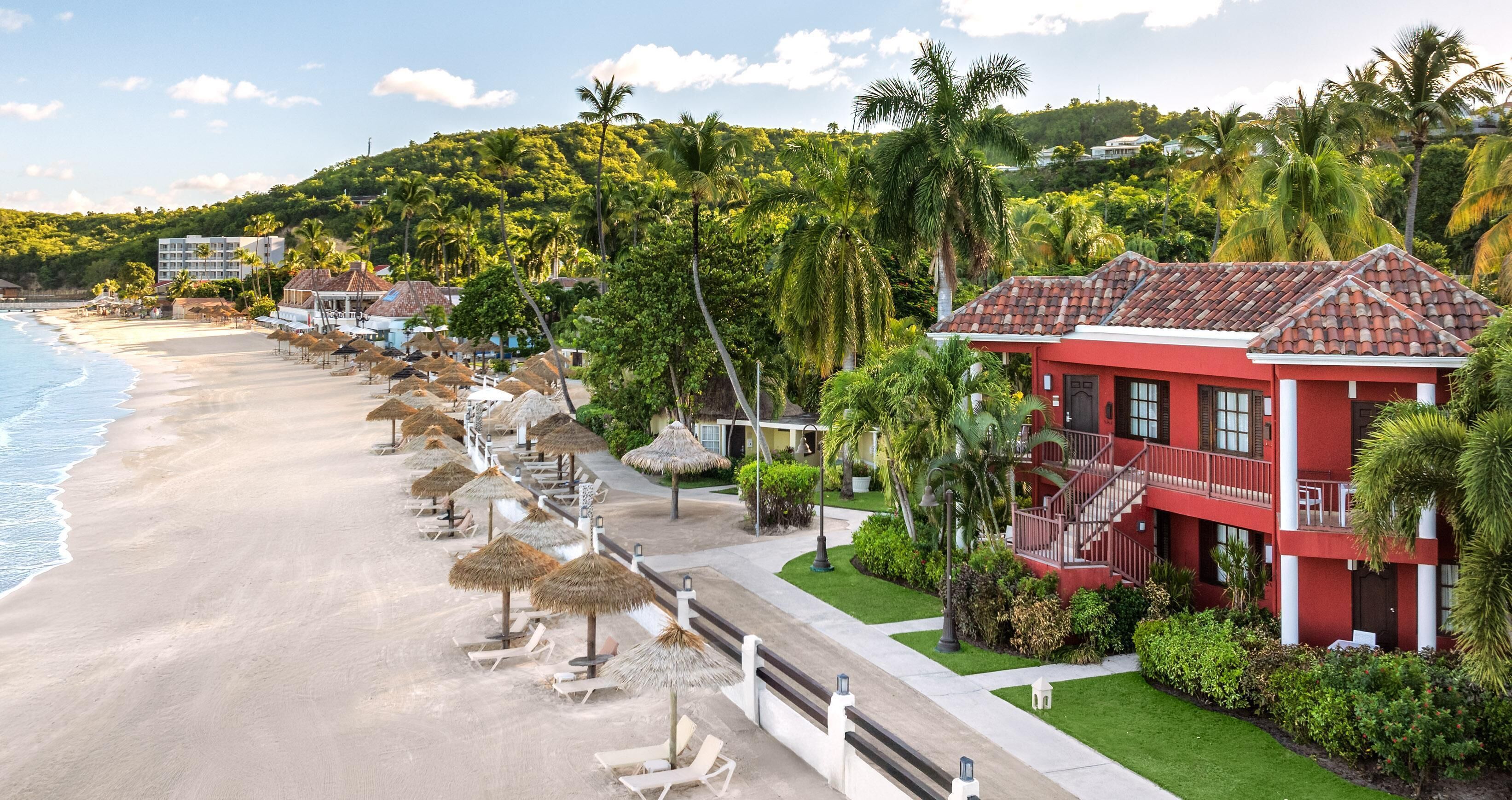 蜜月套房, 1 間臥室, 海景 (Caribbean Beachfront Butler Suite) | 高級寢具、迷你吧、客房內保險箱、遮光布/窗簾