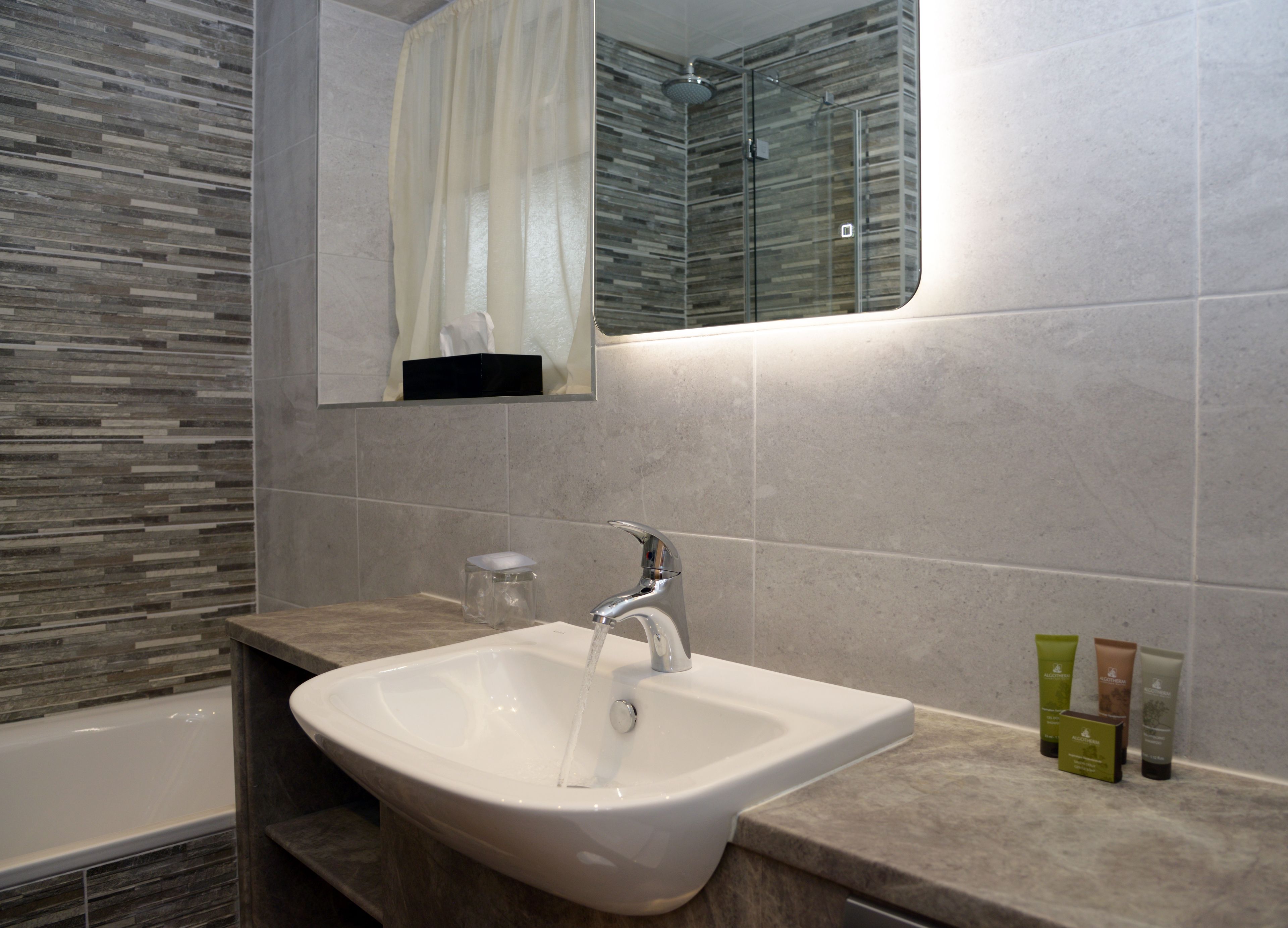 free toiletries, hair dryer, towels, toilet paper