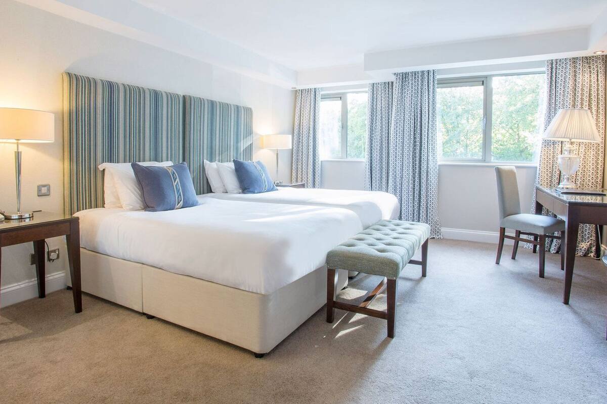 superior twin room | 1 bedroom, in-room safe, desk, iron/ironing board