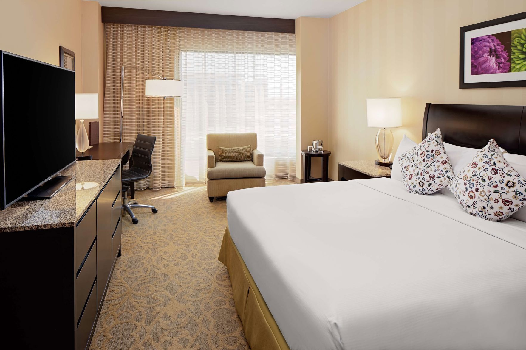 Premium bedding, down comforters, in-room safe, desk