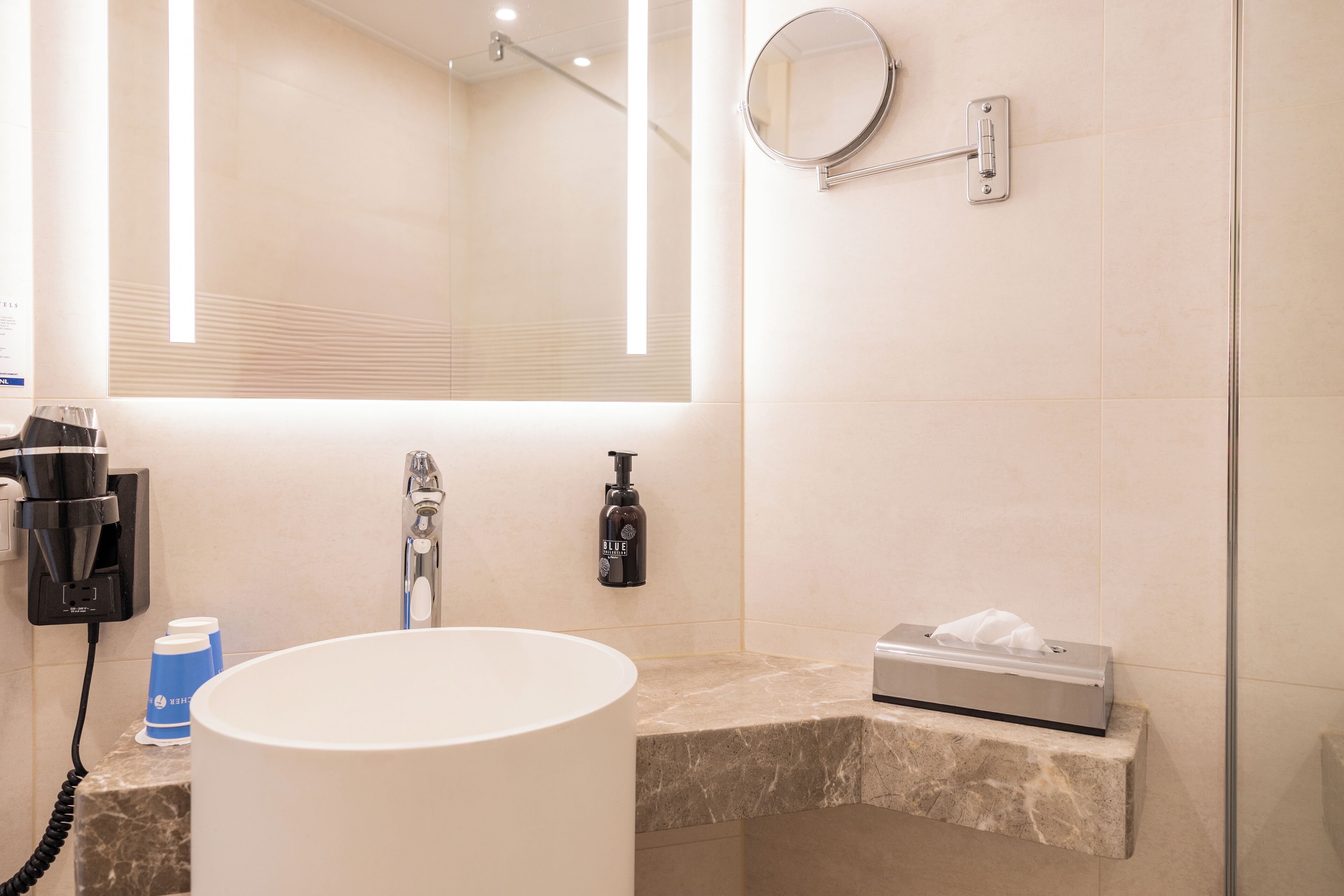 family apartment | bathroom | shower, eco-friendly toiletries, towels