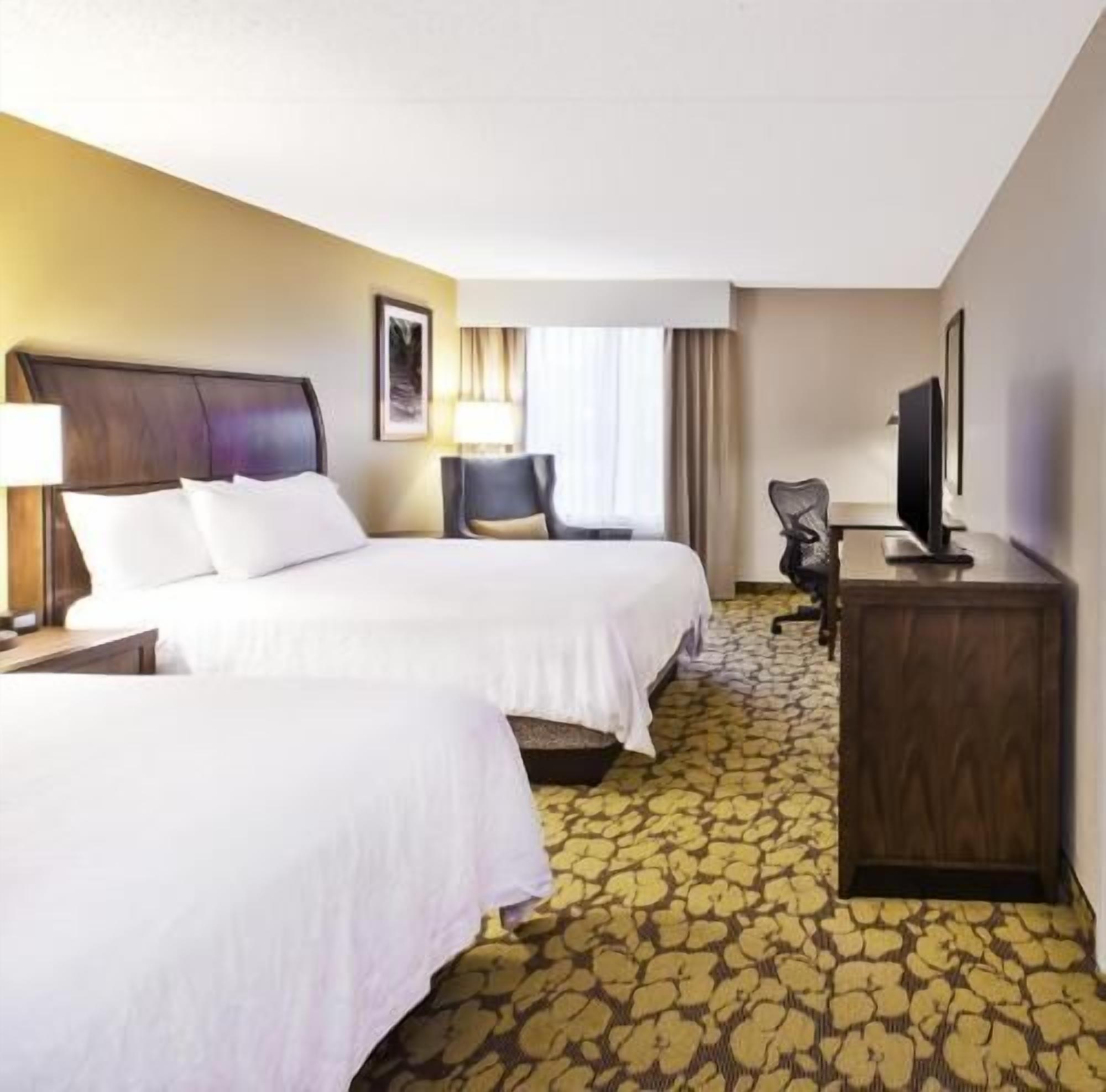 Desk, laptop workspace, blackout drapes, iron/ironing board