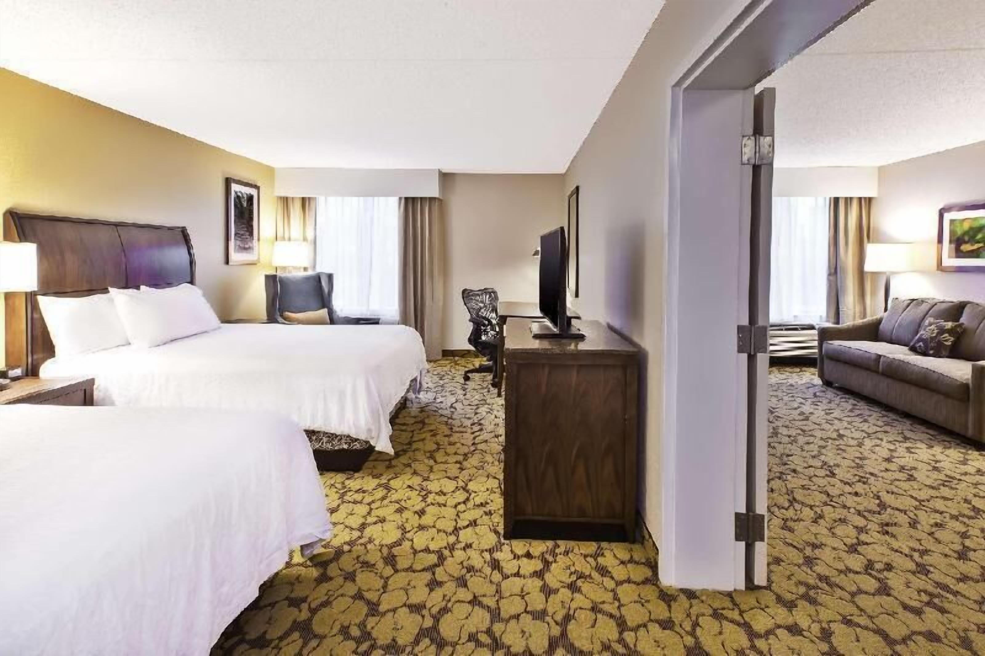 Desk, laptop workspace, blackout drapes, iron/ironing board