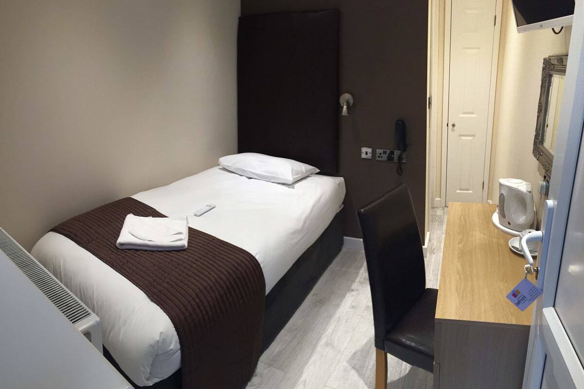 Single Room | Pillowtop beds, desk, blackout drapes, soundproofing