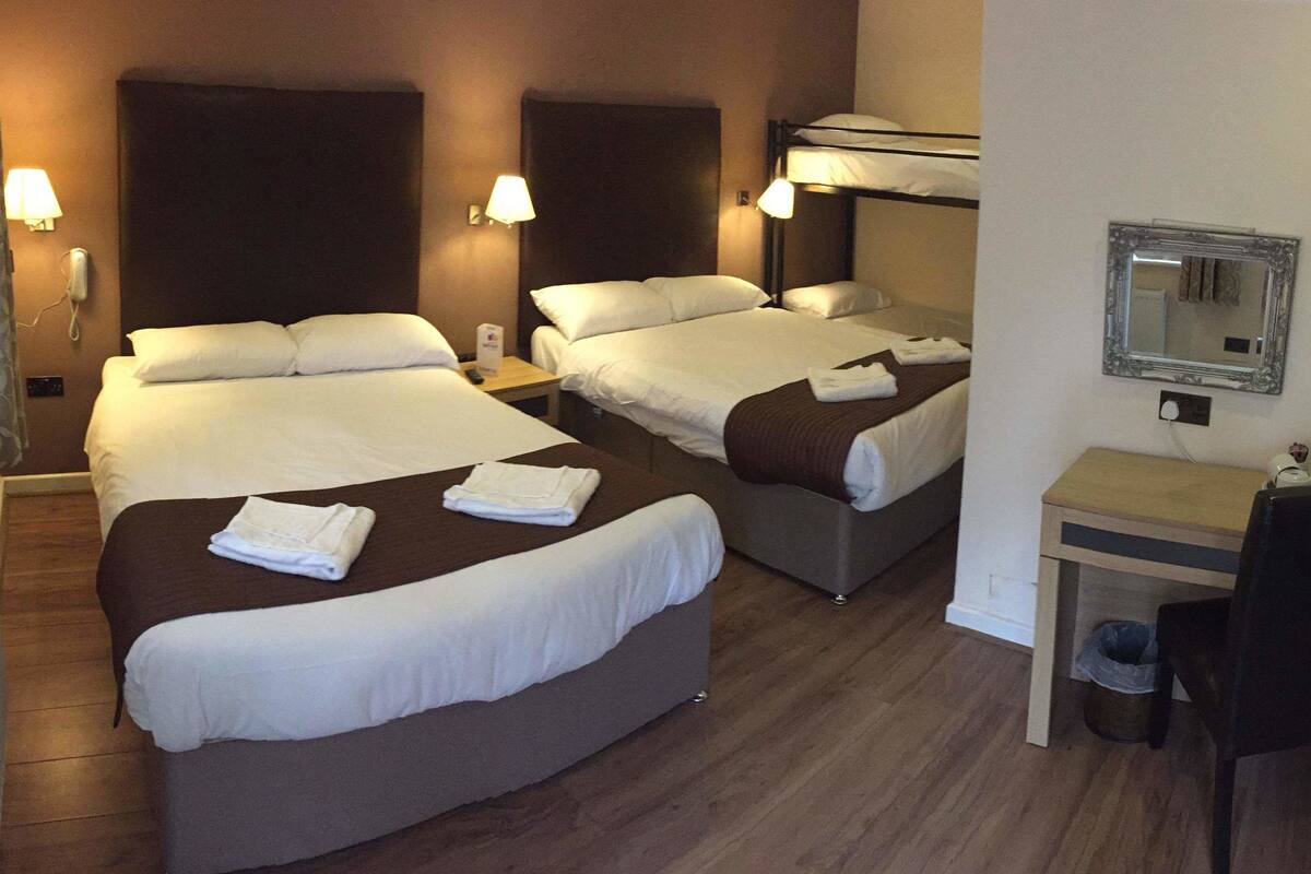 Pillowtop beds, desk, blackout drapes, soundproofing