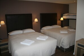 Triple Room | Pillowtop beds, individually decorated, individually furnished, desk