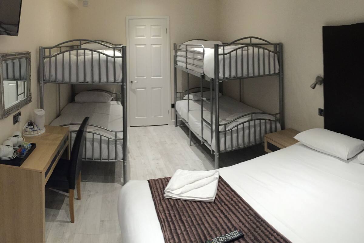 Family Room (For 6) | Pillowtop beds, desk, blackout drapes, soundproofing