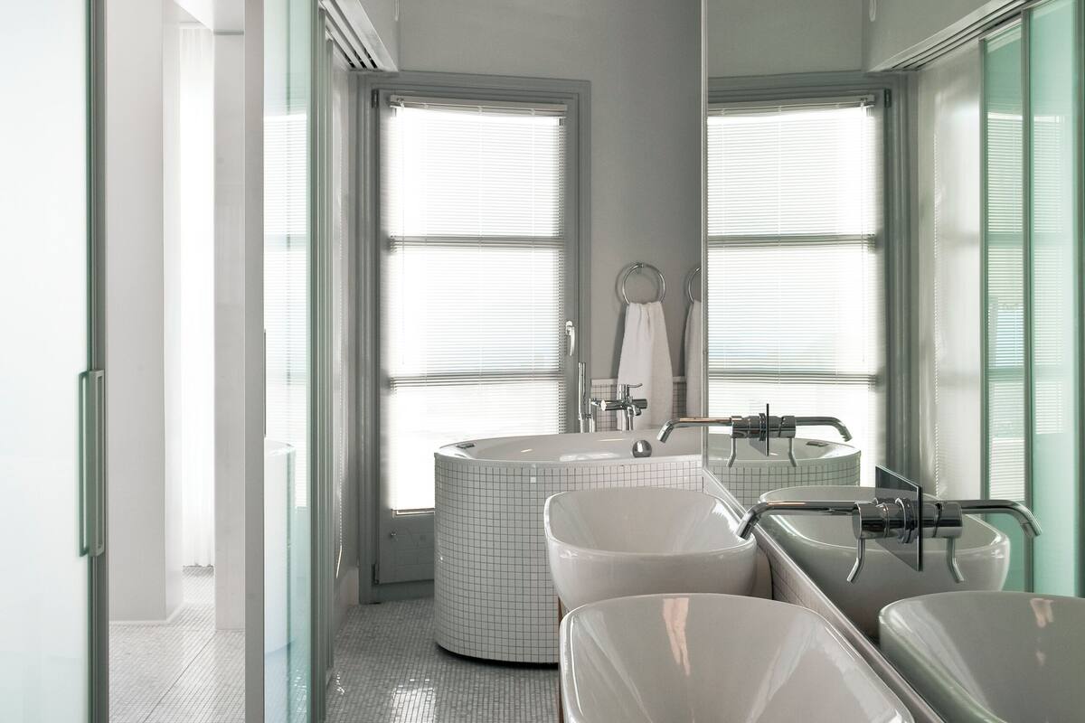 master suite, volcano view | bathroom | designer toiletries, hair dryer, bathrobes, slippers