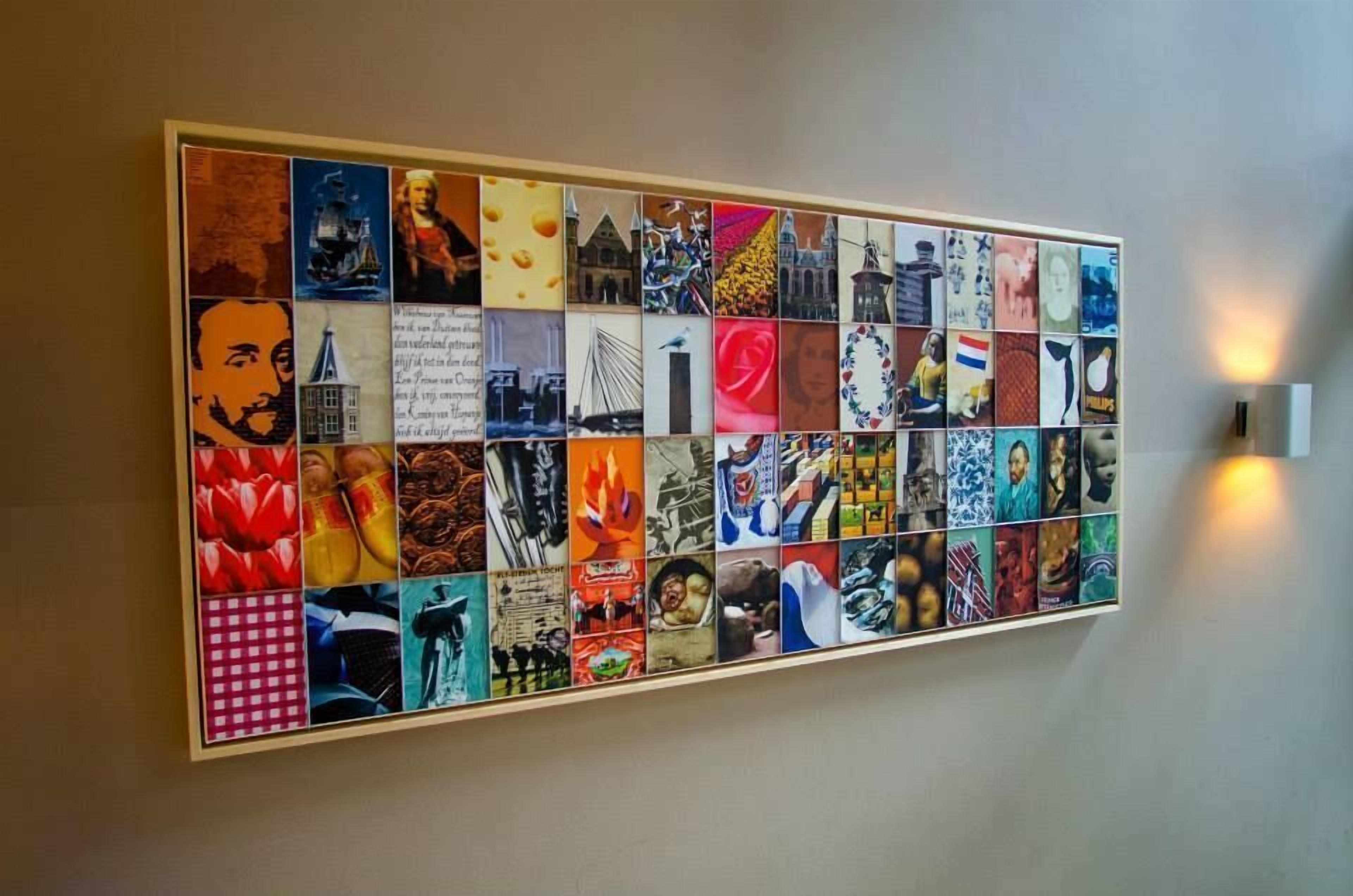 A large, rectangular, multi-panel artwork on a wall.
