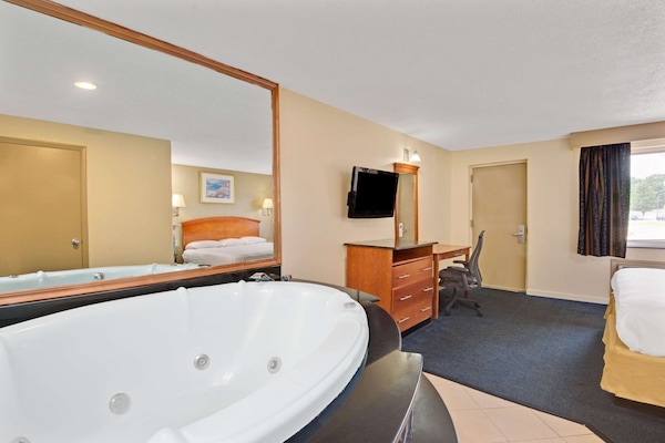 Desk, iron/ironing board, cribs (free), WiFi (free)