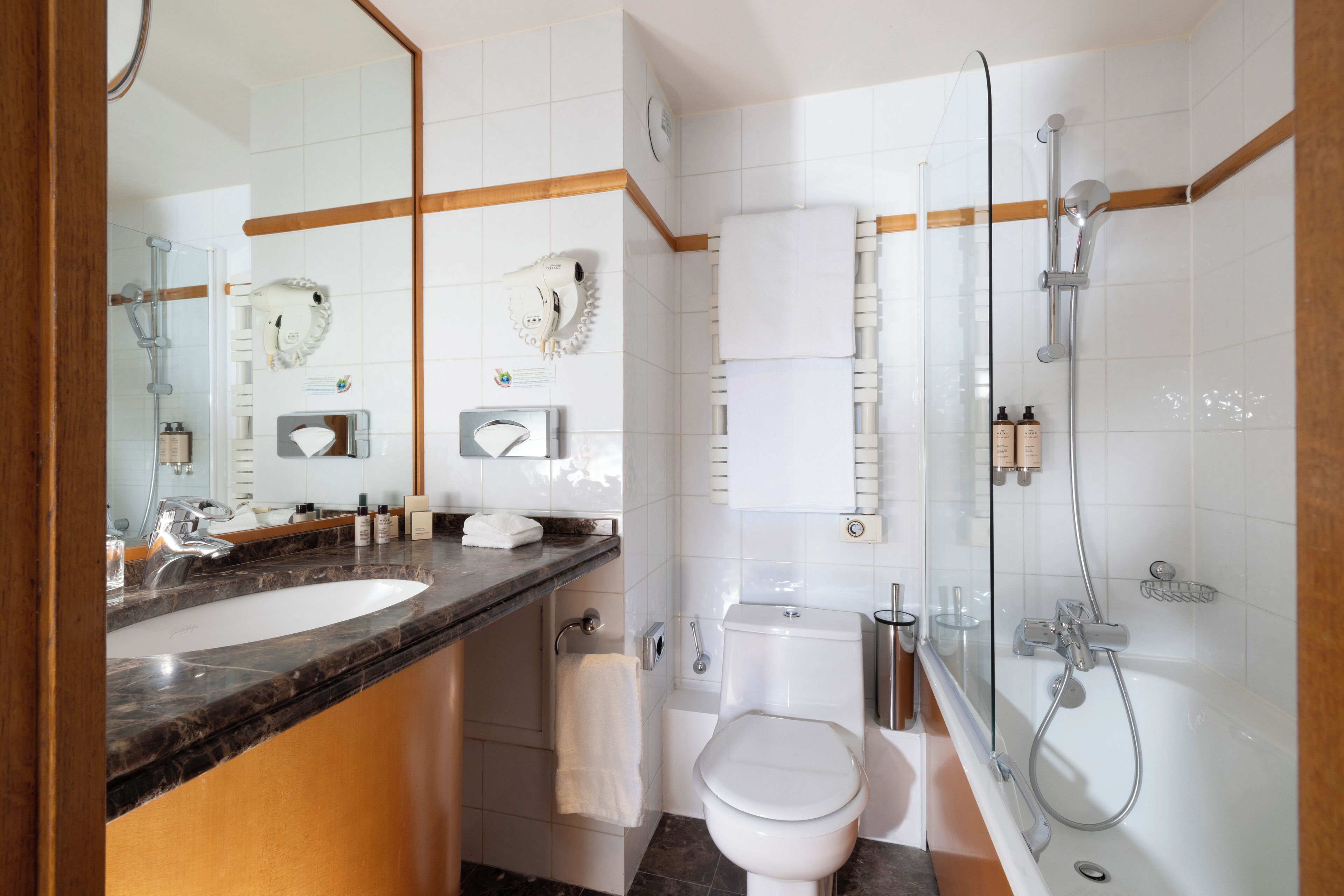 superior triple room | bathroom | deep-soaking bathtub, rainfall showerhead, free toiletries, hair dryer