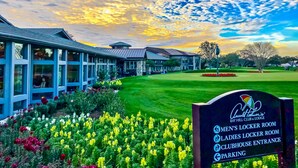 A golf course with a clubhouse entrance, men's and ladies locker rooms, and parking. - Arnold Palmer's Bay Hill Club & Lodge (Orlando)