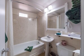 Suite, 2 Queen Beds, Non Smoking | Bathroom | Combined shower/tub, free toiletries, towels