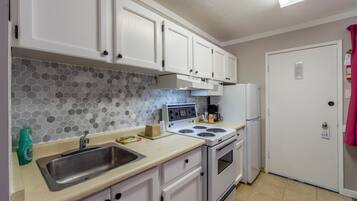 Suite, 2 Queen Beds, Non Smoking | Private kitchen | Fridge, microwave, coffee/tea maker