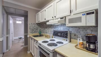 Suite, 2 camas Queen size, para no fumadores | Cocineta privada | Refrigerador, microondas y cafetera y tetera