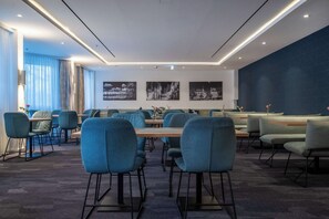 Breakfast, lunch served; international cuisine, al fresco dining 