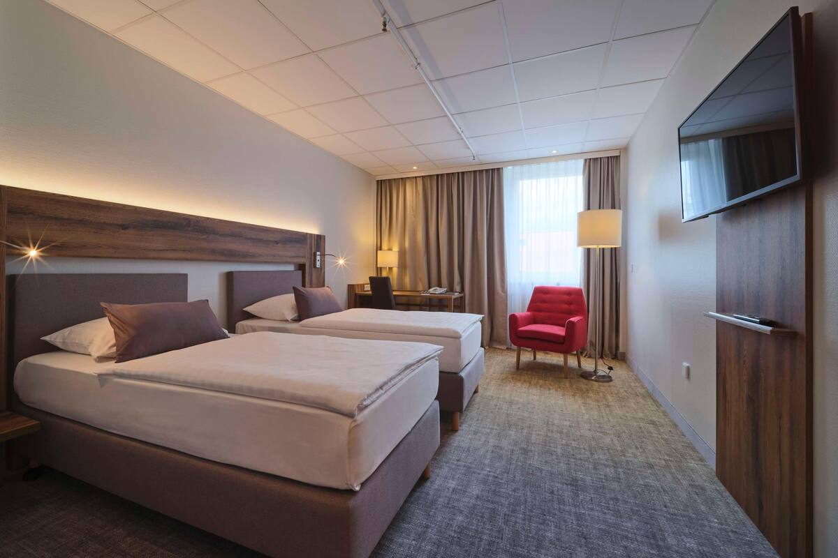 Premium bedding, pillowtop beds, in-room safe, blackout drapes