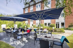 Breakfast, lunch served; international cuisine, al fresco dining 