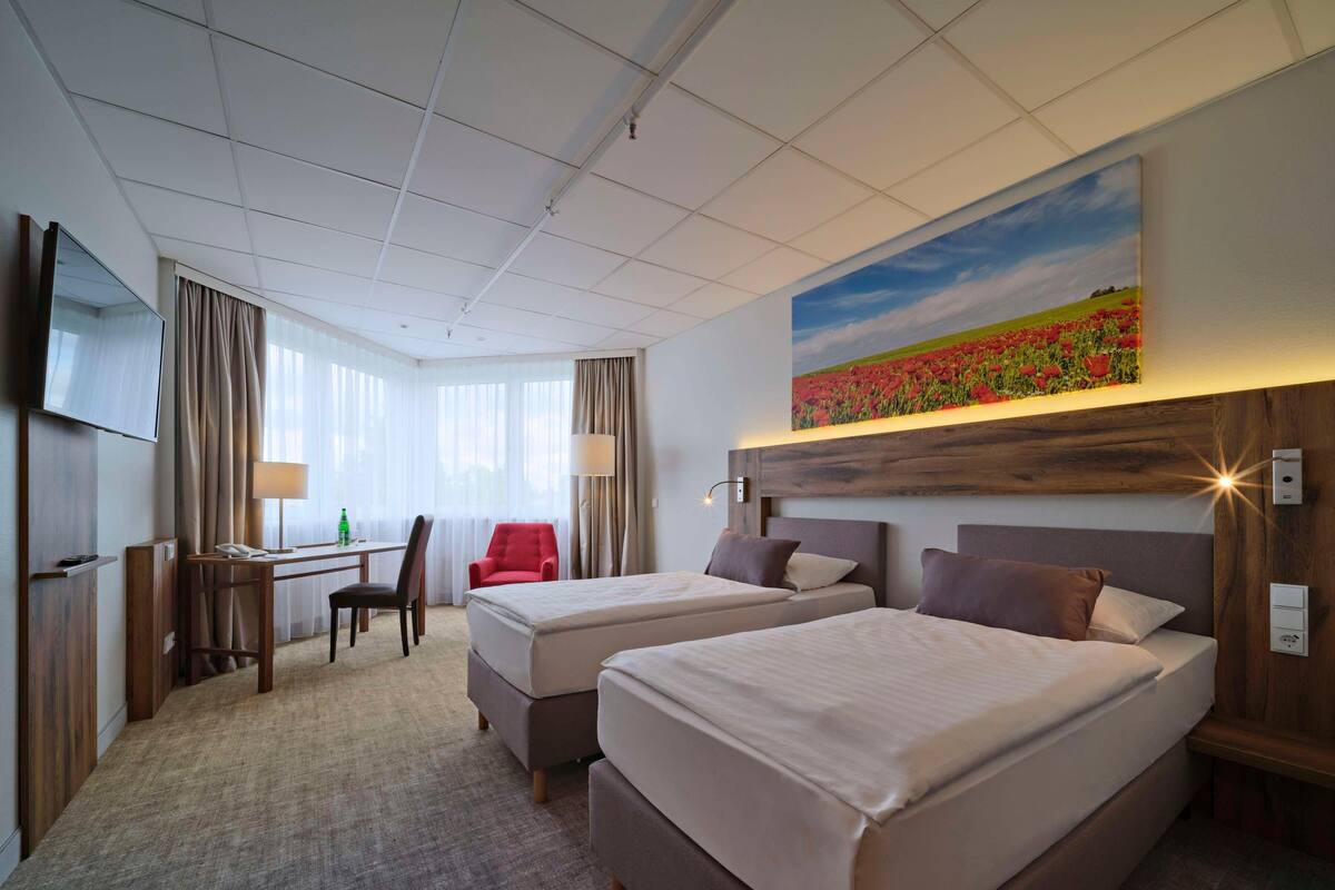 Premium bedding, pillowtop beds, in-room safe, blackout drapes