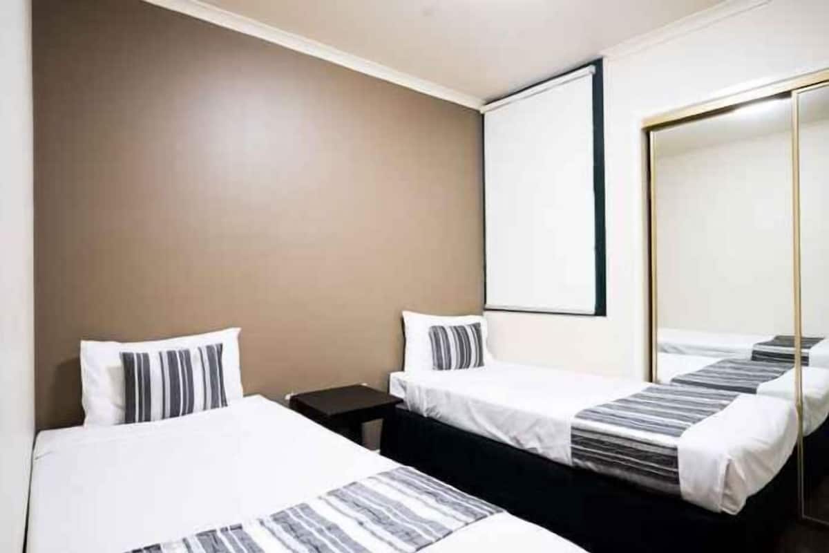 Individually furnished, desk, laptop workspace, iron/ironing board